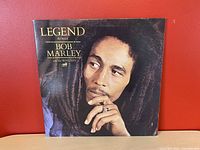 Front of the vinyl album cover featuring Bob Marley portrait, "Legend" album title, and artist name.