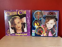 Front covers of two Culture Club vinyl LP albums 'Kissing to Be Clever' and 'Colour by Numbers' showing colorful vintage 1980s photo artwork of band members.