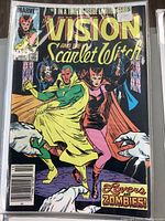 Full front cover of The Vision and The Scarlet Witch comic book issue #1 showing main characters and zombies.