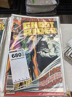 Ghost Rider comic book issue 56 front cover showing Ghost Rider in flames and a character named Night Rider.
