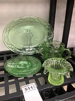 Full set showing all items including plates, tray, double handled cup, and vase