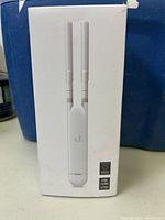 Front view of the product box showing Ubiquiti UAP-AC-M-US UniFi AC Mesh dual antenna access point.