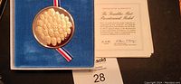 Gold-tone Franklin Mint Bicentennial Medal in blue velvet case with certificate of authenticity