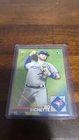 Front photo of Bo Bichette rookie baseball card in plastic case showing player image and card details