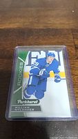 Front view of a William Nylander rookie hockey card from the Parkhurst series, encased in a clear protective sleeve, showing Nylander in blue uniform with number 29.