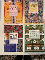 Four books laid flat showing front covers with colorful pattern designs and titles.