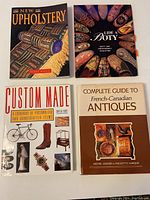 Four design and antiques books arranged flat, covers visible showing titles and subjects.
