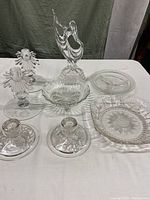 Full lot image showing all pieces together on white table against dark cloth background