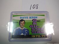 Front side of the Dave Keon hockey card showing player portrait, name, position, and all-star team designation.