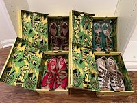 Four pairs of Fly London wedge sandals in original patterned boxes, assorted colors