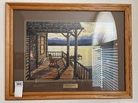 Full view of framed and matted print with wood frame and plaque 'Mountain Lake Retreat'.
