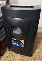 Front view of the black Royal 1840MX crosscut shredder showing brand label and wheels.