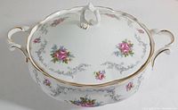 Front angle view of the Royal Albert Tranquility serving bowl with lid, showing floral pattern and gold trimming.