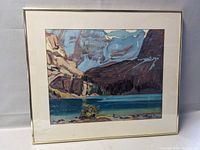 Full view of the framed JEH MacDonald print showing the artwork and frame.