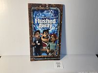 Front cover of the Flushed Away style guide showing main characters in colorful artwork.