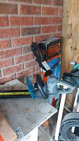 Black & Decker corded string trimmer/edger with protective guard and box