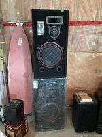 Stacked pair of Samurai Pro Series 518 speakers showing front and side views.