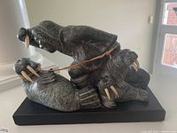 Front angle view of entire carving on base