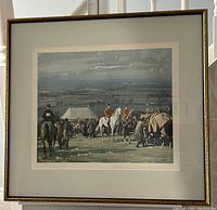 Framed and matted lithograph of a hunting scene by Alfred James Munnings showing riders in red coats and horses with pastoral landscape background.