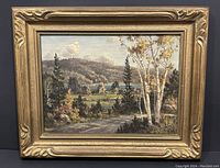 Full frontal view of painting in gold-tone ornate frame