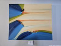 Front view of abstract acrylic painting on canvas featuring flowing colors and textured areas.