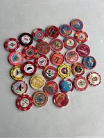 Photo showing a collection of 31 assorted Las Vegas casino chips with denominations mostly $1 and $5 from different casinos.
