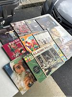 Photo of 11 vinyl LP records on display