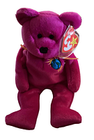 Purple TY Beanie Baby plush bear with embroidered globe and '2000' and TY tag attached.