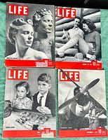 Four vintage LIFE magazines stacked, showing various historical covers from WWII era.