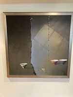 Front view of square oil painting in silver frame