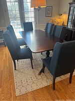 Full view of dining table set with six chairs
