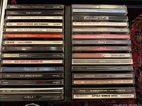 CD spines including Barbra Streisand, Billy Joel, Lori Belibi, Sade, Savage Garden, Shrek 2 soundtrack