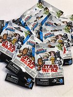 Fifteen Star Wars Micro Force figures in unopened packaging displayed together.