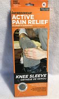 Front packaging of Incrediwear Active Pain Relief Knee Sleeve XL showing product name, size, and image of the sleeve worn on a knee.