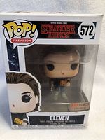 Front view of the Funko Pop Eleven figure in original packaging showing figure and box with BoxLunch exclusive sticker
