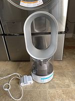 Overall view of Dyson bladeless humidifier with power adapter