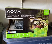 Photo of Noma Admiral Path Light Set box showing product image, window, and branding