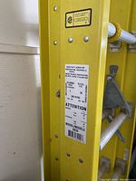 Close-up of model and rating label on fiberglass rail