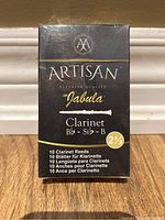 Front view of the black Artisan Jabula clarinet reeds box showing brand, product, and reed strength.