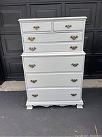 Front overall view of the painted chest showing drawer configuration