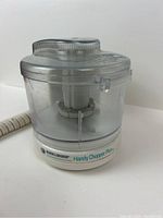 Black & Decker Handy Chopper Plus food chopper with clear plastic bowl and white base.