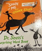 Front cover of Dr. Seuss's 'The Shape of Me and Other Stuff' board book showing cover art and title.