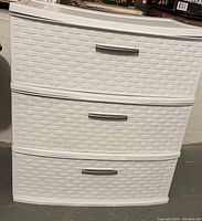 White three drawer plastic organizer with woven pattern and silver handles