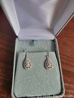 Front view of pair in jewelry box