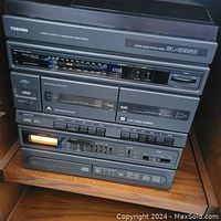 Full view of the Toshiba stereo system Model SL-3358 stack including tuner, cassette deck, equalizer and control buttons