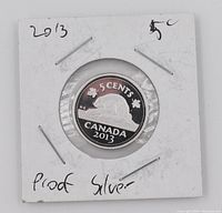 Obverse showing beaver design, date and purity.