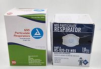 Two sealed boxes of N95 masks, one Dynarex with 20 masks, one with 10 masks with valve
