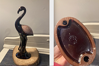 Front side view of ceramic flamingo figurine and bottom view showing unclear maker's mark.