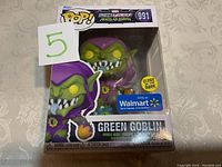 Green Goblin Funko POP! figure in original box with Walmart exclusive and glow in the dark sticker visible