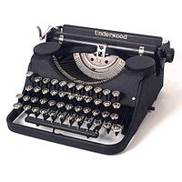 Front left angle view of typewriter showing key layout and finish